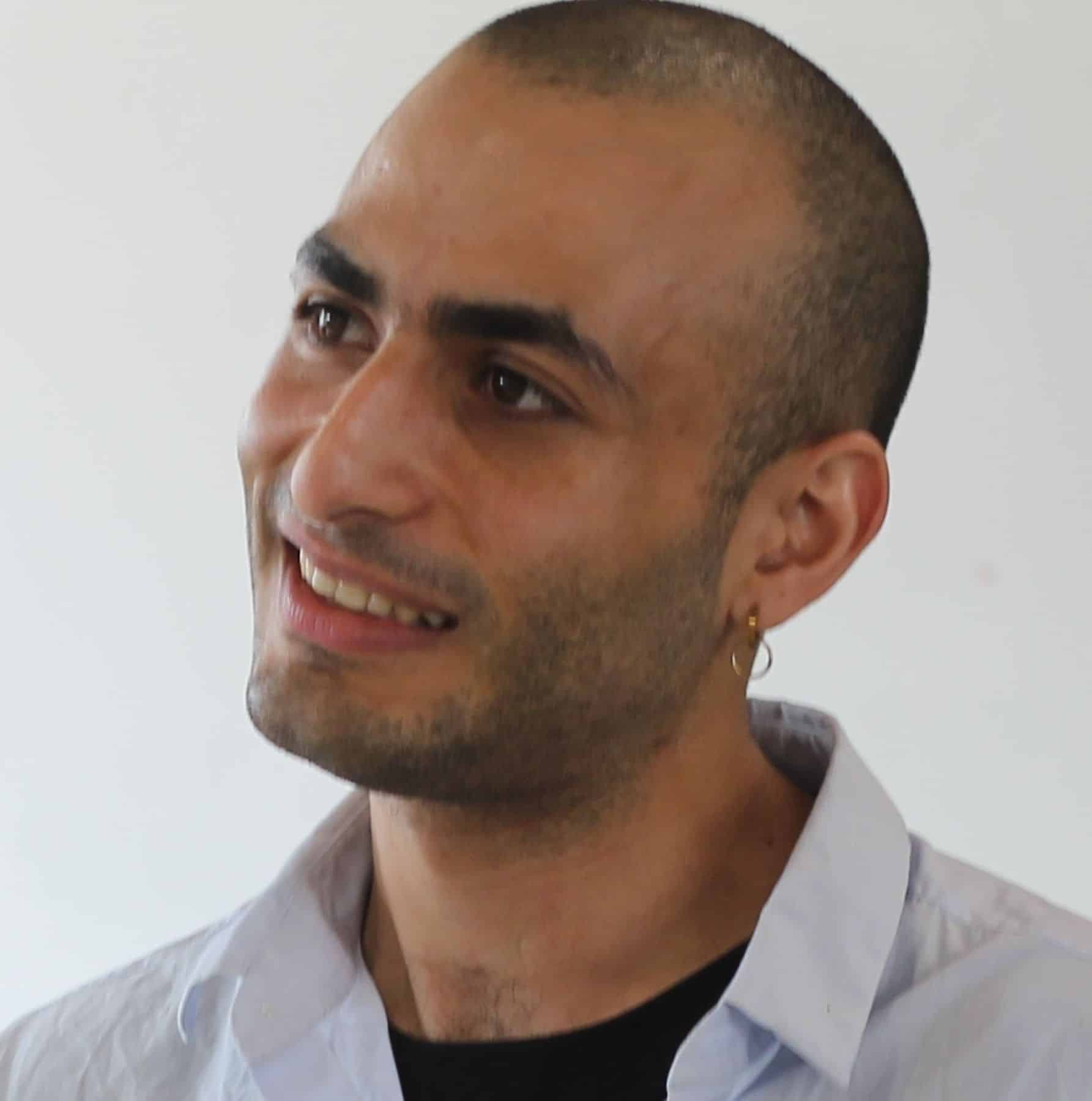Close up portrait image of artist Bassam Issa Al-Sabah